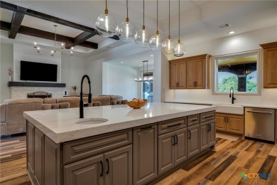 Situated on nearly 5 private acres in the prestigious Mystic