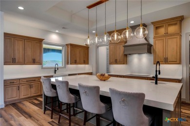 Situated on nearly 5 private acres in the prestigious Mystic