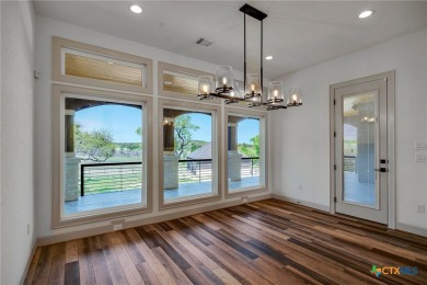 Situated on nearly 5 private acres in the prestigious Mystic