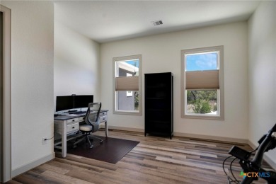 Situated on nearly 5 private acres in the prestigious Mystic