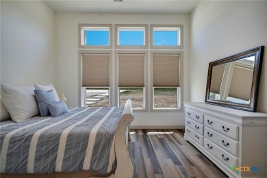 Situated on nearly 5 private acres in the prestigious Mystic