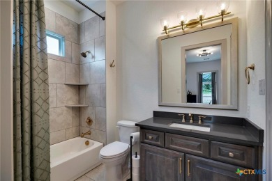 Situated on nearly 5 private acres in the prestigious Mystic