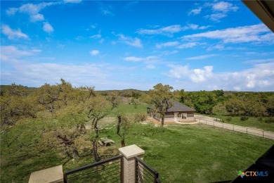 Situated on nearly 5 private acres in the prestigious Mystic