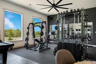 Situated on nearly 5 private acres in the prestigious Mystic