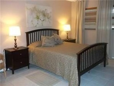 Beautiful, bright and spacious 2 bedroom 2 bath condo with golf