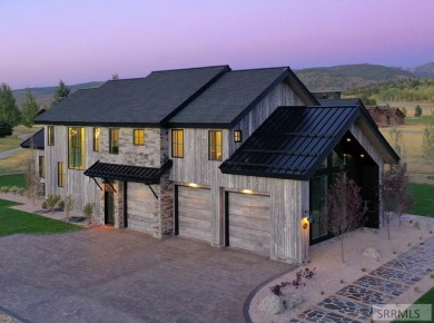 Positioned on the 18th green of the prestigious Teton Springs