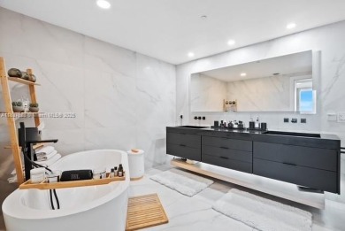 Experience luxury living in this stunning 3-bedroom, 4-bathroom