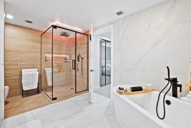 Experience luxury living in this stunning 3-bedroom, 4-bathroom