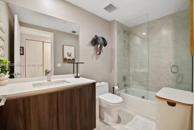 Experience luxury living in this stunning 3-bedroom, 4-bathroom