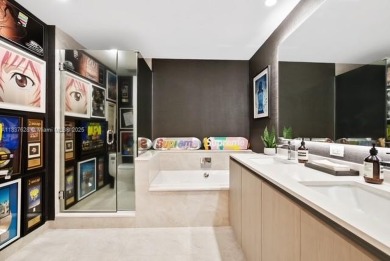 Experience luxury living in this stunning 3-bedroom, 4-bathroom