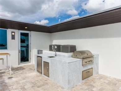 Enjoy the beach and a boating lifestyle in this modern