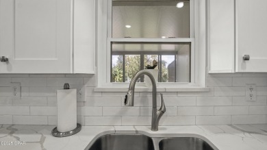 6904 Yellow Bluff Road presents a rare opportunity to own a