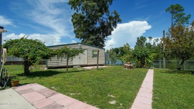 6904 Yellow Bluff Road presents a rare opportunity to own a