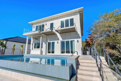 This stunning contemporary home on Murrells Inlet has 5-bedroom