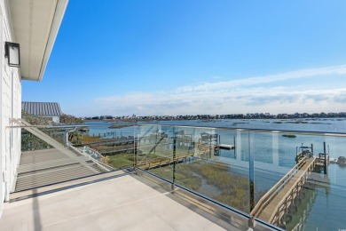 This stunning contemporary home on Murrells Inlet has 5-bedroom