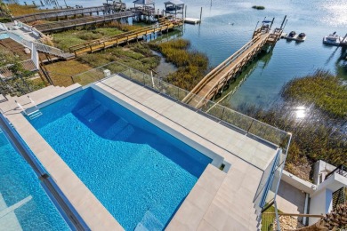 This stunning contemporary home on Murrells Inlet has 5-bedroom