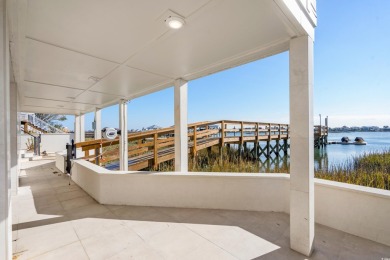 This stunning contemporary home on Murrells Inlet has 5-bedroom