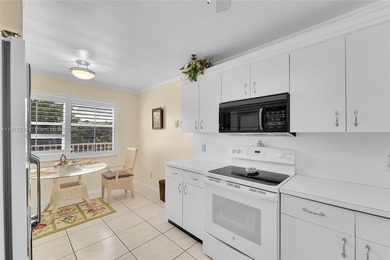 A TOP-RATED 55+ COMMUNITY! Beautifully maintained 2/2 condo in