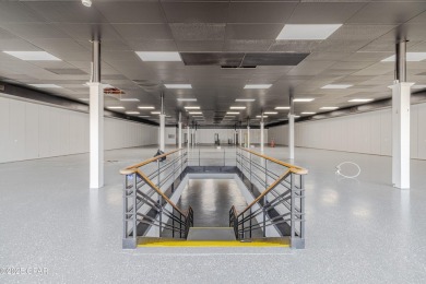 This solidly constructed, three-level commercial building offers