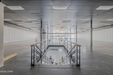 This solidly constructed, three-level commercial building offers