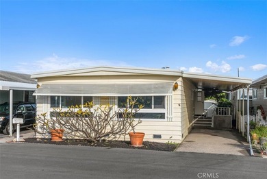 Welcome to 15621 Beach Blvd #103, a spacious 2-bedroom, 2-bath