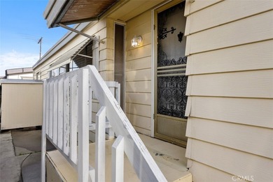 Welcome to 15621 Beach Blvd #103, a spacious 2-bedroom, 2-bath