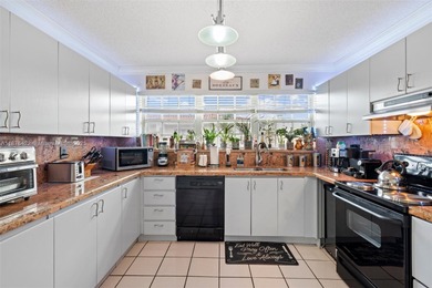 Rare opportunity to own a 2/2 condo with a large private patio