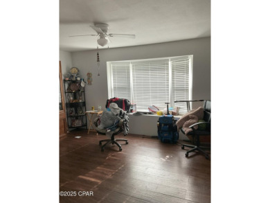 Charming Brick Home with Endless Potential in the Heart of