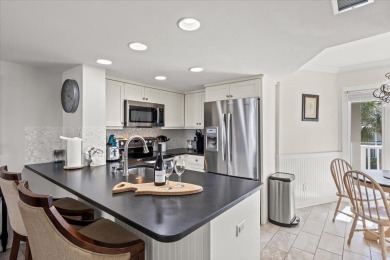 This beautifully updated second-floor condo, located in the