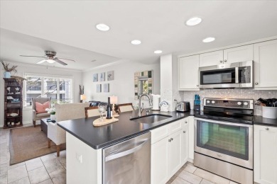 This beautifully updated second-floor condo, located in the