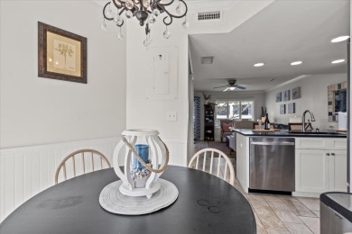 This beautifully updated second-floor condo, located in the