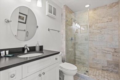 This beautifully updated second-floor condo, located in the