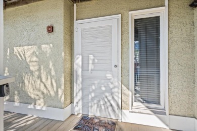 This beautifully updated second-floor condo, located in the