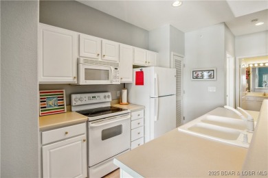 Top floor 2 bedroom Monarch Cove condo with vaulted ceilings