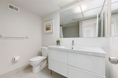 Experience refined beachfront living in this sophisticated Park