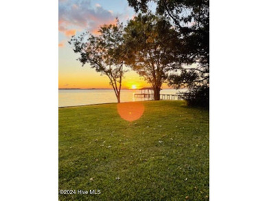 Large WATERFRONT lot (approx 150' River front) w/ a 4 bedrooms/1