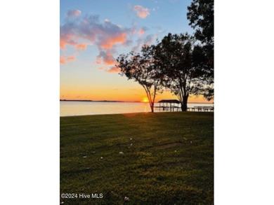 Large WATERFRONT lot (approx 150' River front) w/ a 4 bedrooms/1