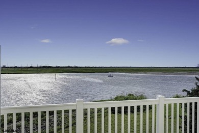 NOW IS YOUR CHANCE TO OWN A CUSTOM BUILT BAY FRONT HOME. THIS