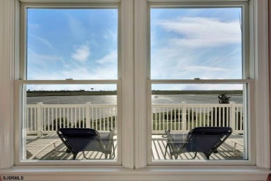 NOW IS YOUR CHANCE TO OWN A CUSTOM BUILT BAY FRONT HOME. THIS