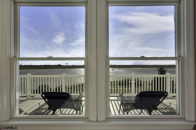 NOW IS YOUR CHANCE TO OWN A CUSTOM BUILT BAY FRONT HOME. THIS