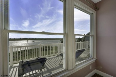 NOW IS YOUR CHANCE TO OWN A CUSTOM BUILT BAY FRONT HOME. THIS