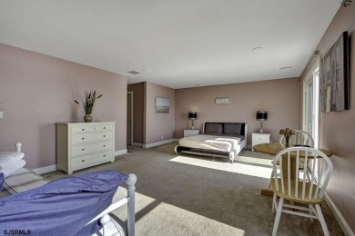 NOW IS YOUR CHANCE TO OWN A CUSTOM BUILT BAY FRONT HOME. THIS