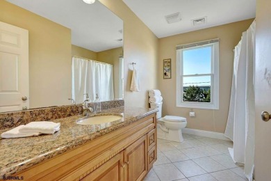 NOW IS YOUR CHANCE TO OWN A CUSTOM BUILT BAY FRONT HOME. THIS