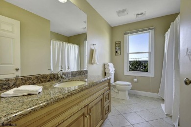 NOW IS YOUR CHANCE TO OWN A CUSTOM BUILT BAY FRONT HOME. THIS