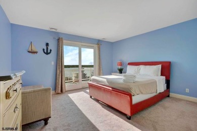 NOW IS YOUR CHANCE TO OWN A CUSTOM BUILT BAY FRONT HOME. THIS