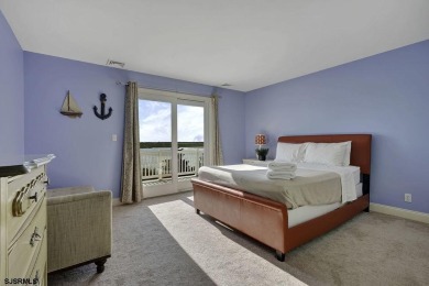 NOW IS YOUR CHANCE TO OWN A CUSTOM BUILT BAY FRONT HOME. THIS