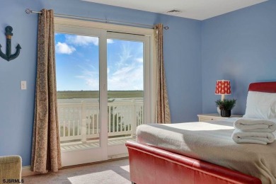 NOW IS YOUR CHANCE TO OWN A CUSTOM BUILT BAY FRONT HOME. THIS