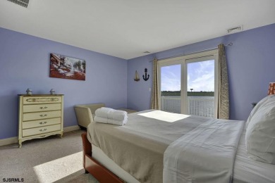 NOW IS YOUR CHANCE TO OWN A CUSTOM BUILT BAY FRONT HOME. THIS