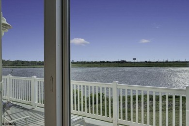 NOW IS YOUR CHANCE TO OWN A CUSTOM BUILT BAY FRONT HOME. THIS