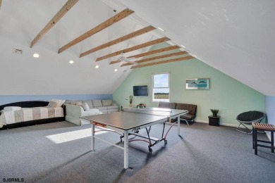 NOW IS YOUR CHANCE TO OWN A CUSTOM BUILT BAY FRONT HOME. THIS